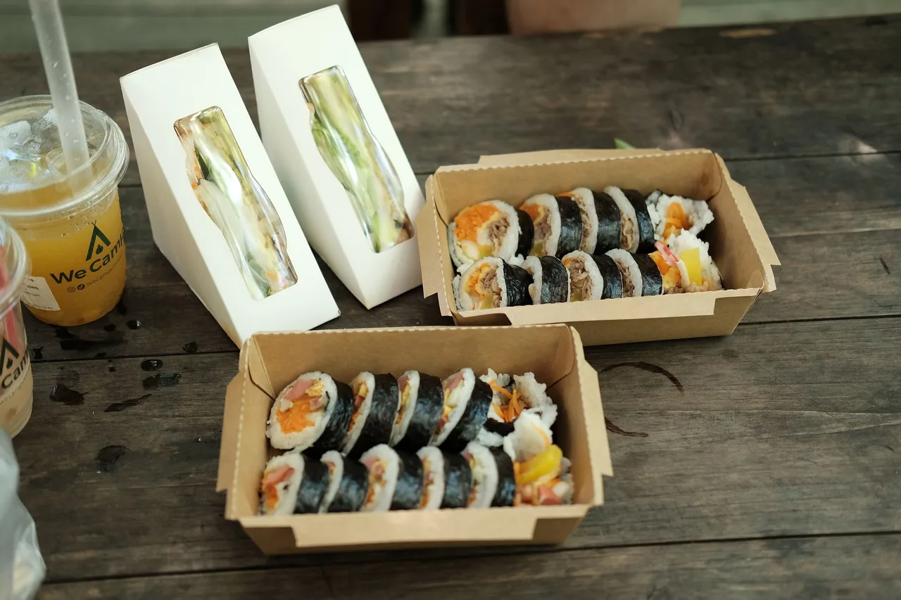 Mini mayak gimbap rolls served with a mustard dip