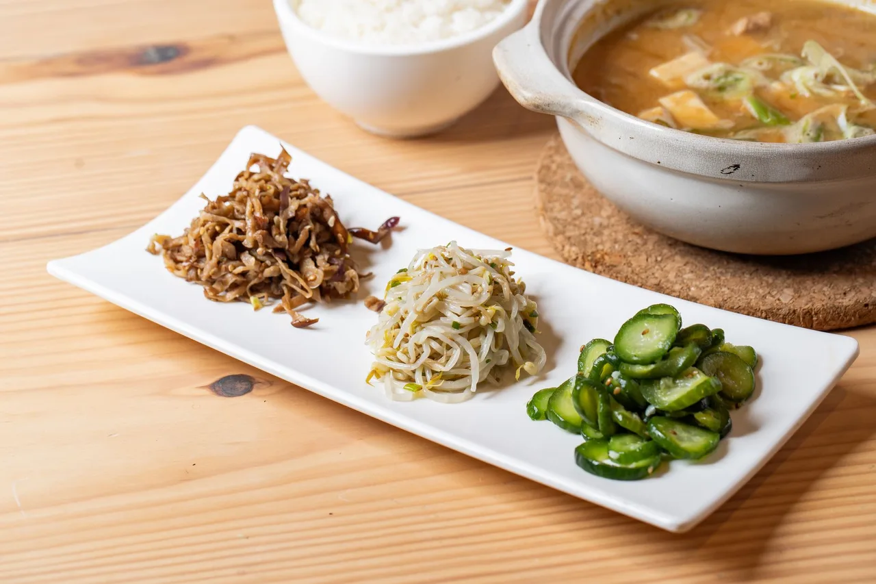 A spread of Korean set-meal dishes on a restaurant table