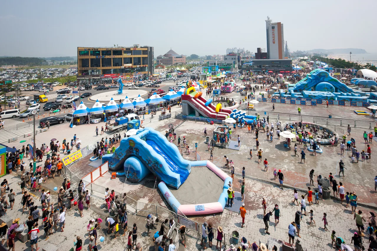 Mud sliding at Boryeong Mud Festival