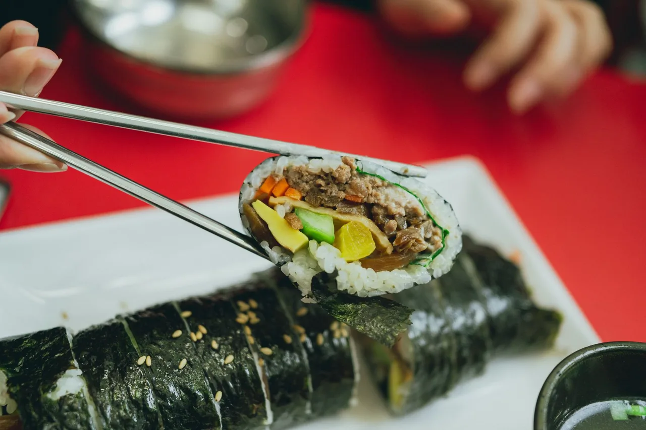 Mini mayak gimbap rolls served with a mustard dip